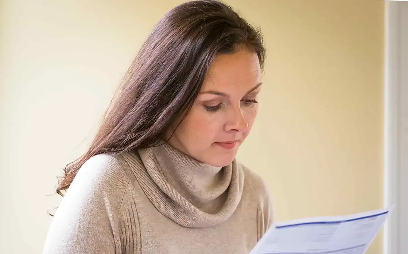 Woman reviewing her bill